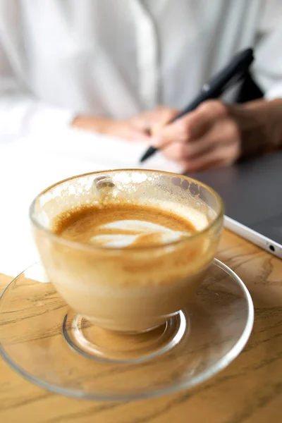 Transparent Cup Coffee Capuccino Foreground Business Lady White Shirt Background — Zdjęcie stockowe