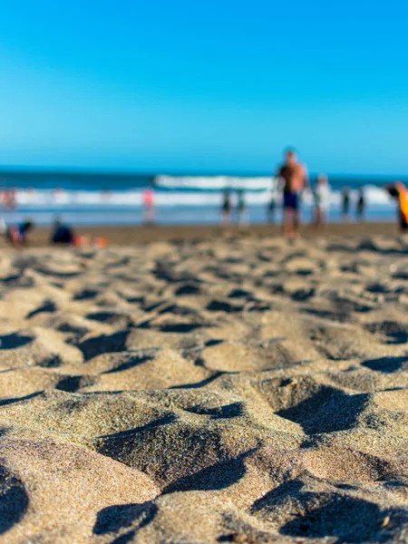 Summer time, sand, people and sea