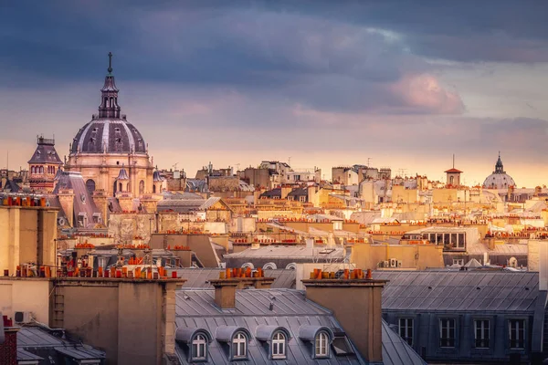 Quarter latin parisian roofs and domes at golden sunrise Paris, France