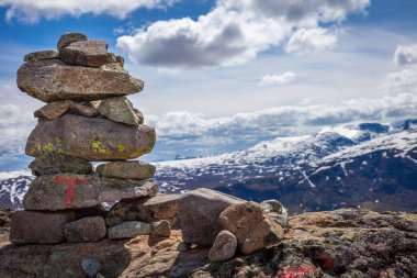 Inukshuk, Stacked stones above jotunheimen mountains in Norway, Scandinavia