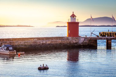 Alesund Sea port harbor with ships at peaceful dawn, Norway, Scandinavia