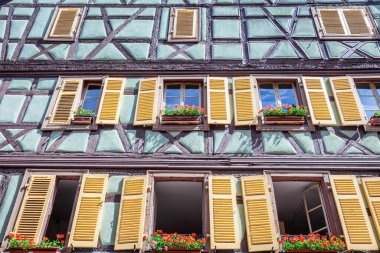 Colmar beautiful alsatian architecture at springtime with flowers, Eastern France