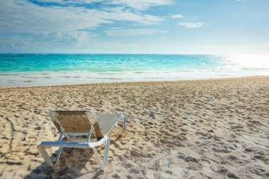 Tropical paradise: Cancun idyllic caribbean with beach chair, Riviera Maya, Mexico
