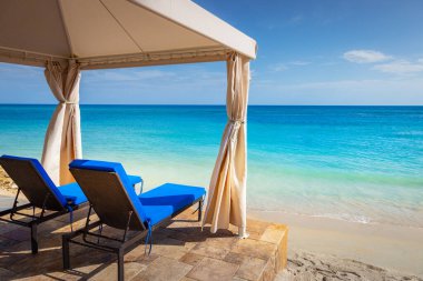 Tropical paradise: idyllic caribbean beach with pier and gazebo, Montego Bay, Jamaica