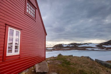 Red Rorbu shelter in Hardanger conservation area, Norway, Scandinavia