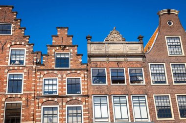 Amsterdam buildings and dutch architecture at sunrise, Netherlands