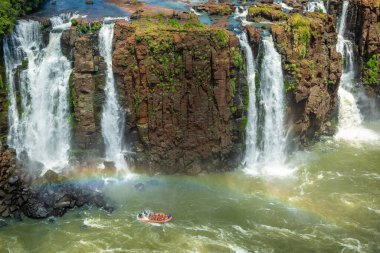 Idyllic Iguacu falls and motorboat in southern Brazil , South America