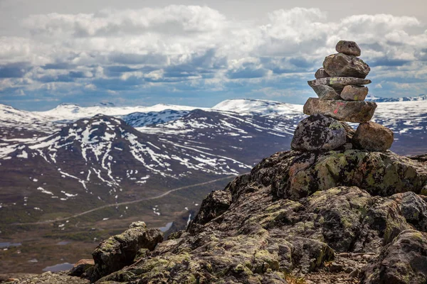 Inukshuk, Stacked stones above jotunheimen mountains in Norway, Scandinavia