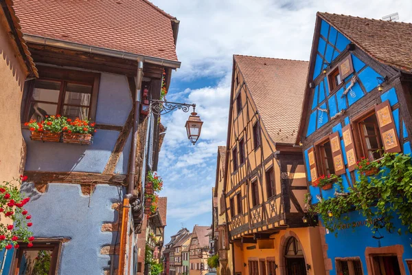 Riquewihr beautiful alsatian architecture at springtime with flowers, Eastern France