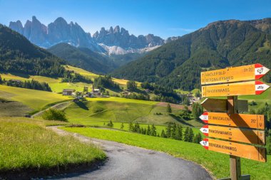 Idyllic St. Magdalena village with famous church in Val di Funes, Dolomites, Northern Italy