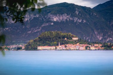 Bellagio skyline view from Lake Como at golden sunset, northern Italy, long exposure
