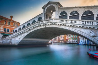 Rialto bridge at peaceful dramatic dawn and Grand Canal, Venice, Italy, long exposure