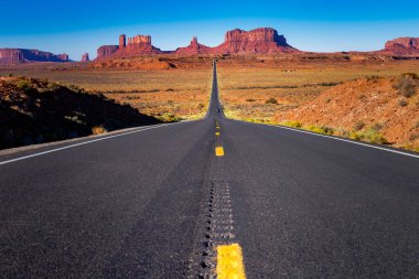 Highway Road U.S. Highway 163 and Monument Valley at sunset, Arizona, United States