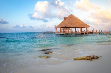 Cancun idyllic caribbean beach and gazebo rustic Palapa, Riviera Maya, Mexico