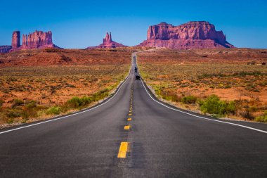 Highway Road U.S. Highway 163 and Monument Valley at sunset, Arizona, United States