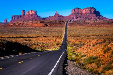 Highway Road U.S. Highway 163 and Monument Valley at sunset, Arizona, United States