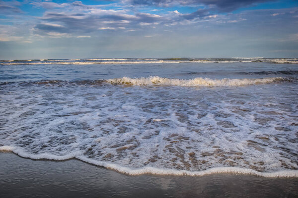 Beach in Torres city, Rio Grande do Sul state at sunset, Southern Brazil, South America