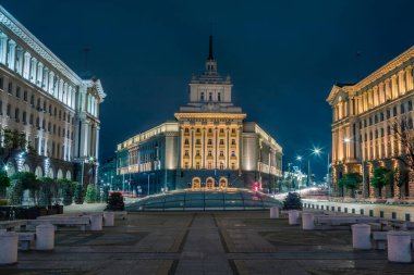 Largo ensemble, National Assembly and city lights at night, Sofia, Bulgaria, Eastern Europe clipart