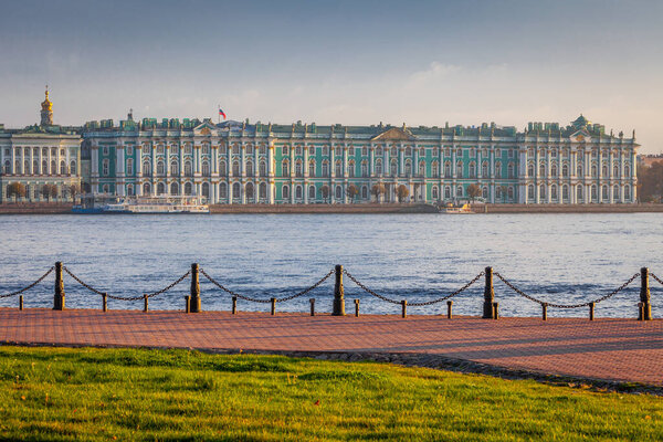 View of Neva River and St. Petersburg at peaceful golden sunset, Russia