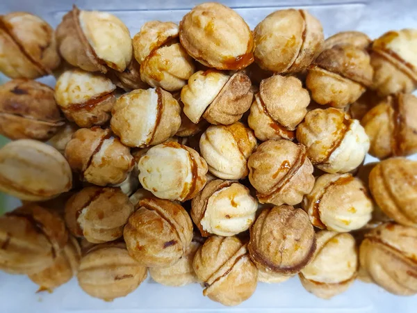 Close Plate Delicious Food Baked Nuts Condensed Milk — Fotografia de Stock