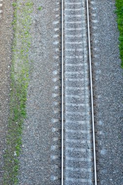 railway tracks on the road, view from above on the railway road, travelling, direction of way 