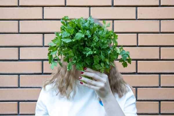 Young Woman White Shirt Green Parsley Bunch Her Hands She — Stockfoto