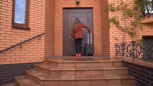 Beautiful Stylish Woman Orange Jacket Snickers Black Suitcase Running Stairs — Vídeo de Stock