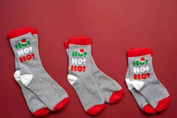 Christmas New Year Family Size Socks Red Background Festive Season — Stock Photo, Image