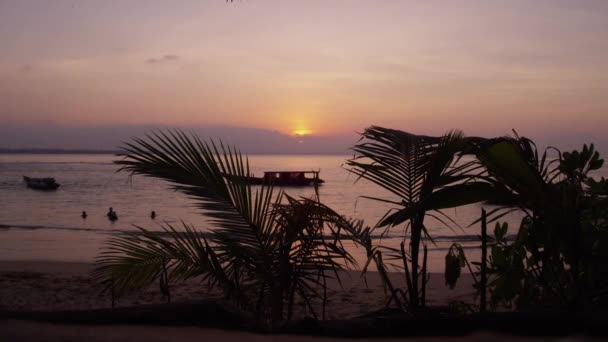 Orange Sunset Overlooking Beach People Rest Watching Sun Horizon Small — Stockvideo