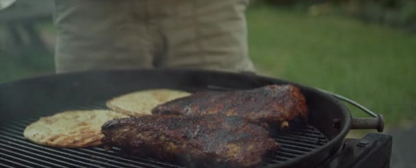 Cook Opens Lid Grill Sear Steaks Spices Grill Roaring Fire — Stock video
