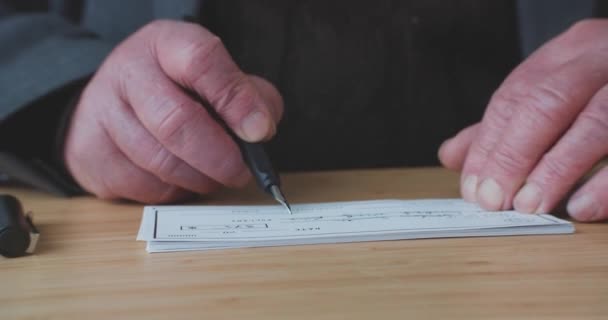 Senior Man Analyzes Signs Check Money — ストック動画