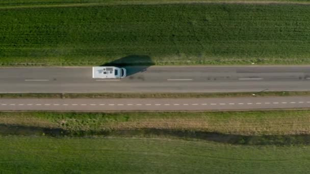 Drone Follows Brown Van Clear Blue Day Caravan Wheels Moves — Vídeos de Stock