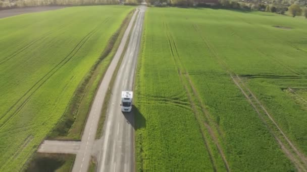 Drone Follows Brown Van Clear Blue Day Caravan Wheels Moves — Video Stock