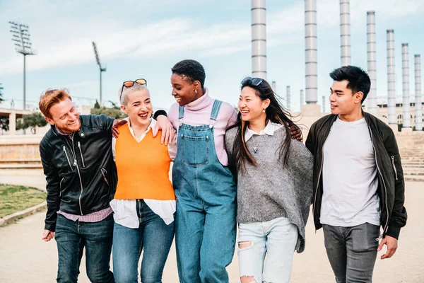 Five Young Adult Friends Meeting Hugging Laughing Outdoors High Quality — Stockfoto