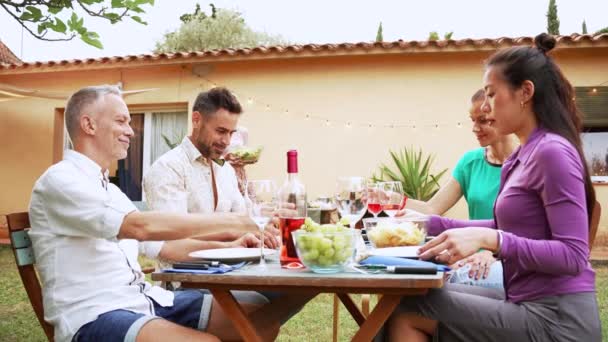 Mature People Celebrating Bbq Party Sharing His Food His Friends — Stockvideo