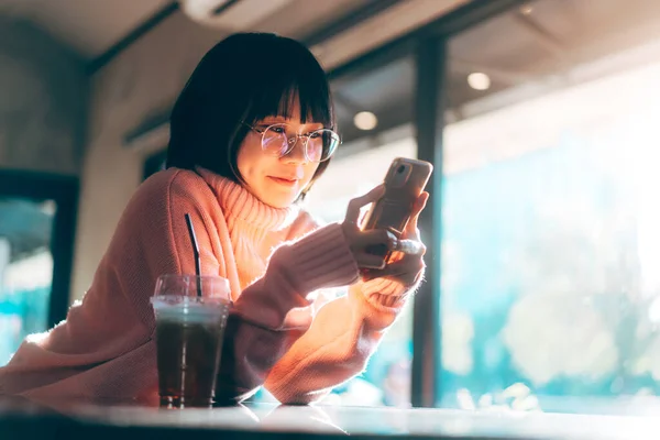 Young Adult Happy Asian Woman Wear Eyeglasses Using Mobile Phone — 图库照片