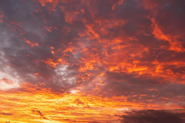 Beautiful orange sunrise with clouds.