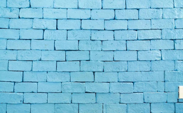 Colorful brick wall, bright blue vintage style of brick background, Texture of blue brick.