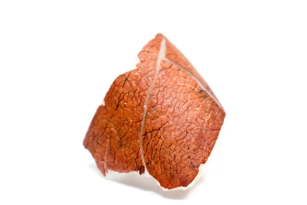 Bu beyaz arka planı olan bir hindistan cevizi parçası..