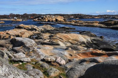 A beautiful view of the rocky coastline of a place called 