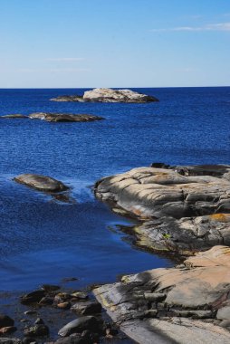 A beautiful view of the rocky coastline of a place called 