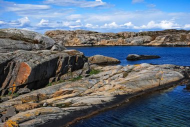 A beautiful view of the rocky coastline of a place called 
