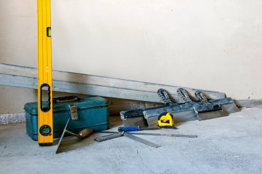 construction site with a drill and a screwdriver