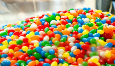 colorful candy background. close up of a pile of multicolored candies.