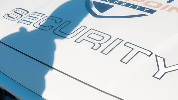 Close up of hood of security mobile patrol car.