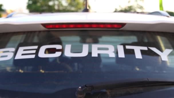 Security Car Patrolling Streets Sunset — Stok video