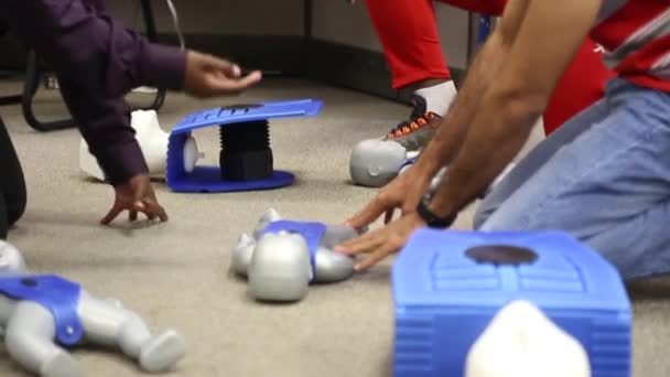 Staff Training Conduct First Aid Cpr Dummy Doll Aed Machine — Stockvideo