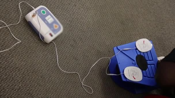 Staff Training Conduct First Aid Cpr Dummy Doll Aed Machine – Stock-video