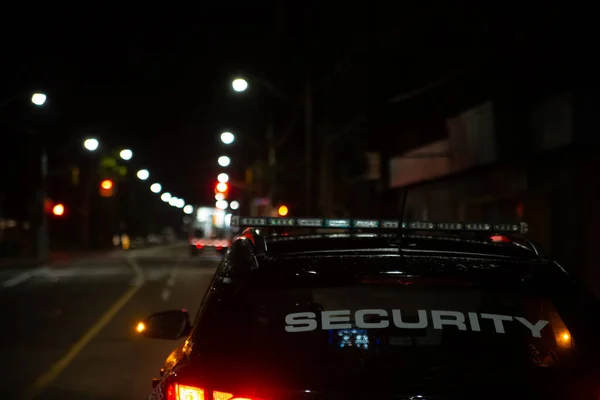 Security Guard Patroling Construction Site Night City — стоковое фото