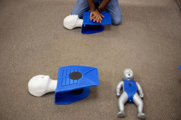 Staff training for CPR first aid with the AED.